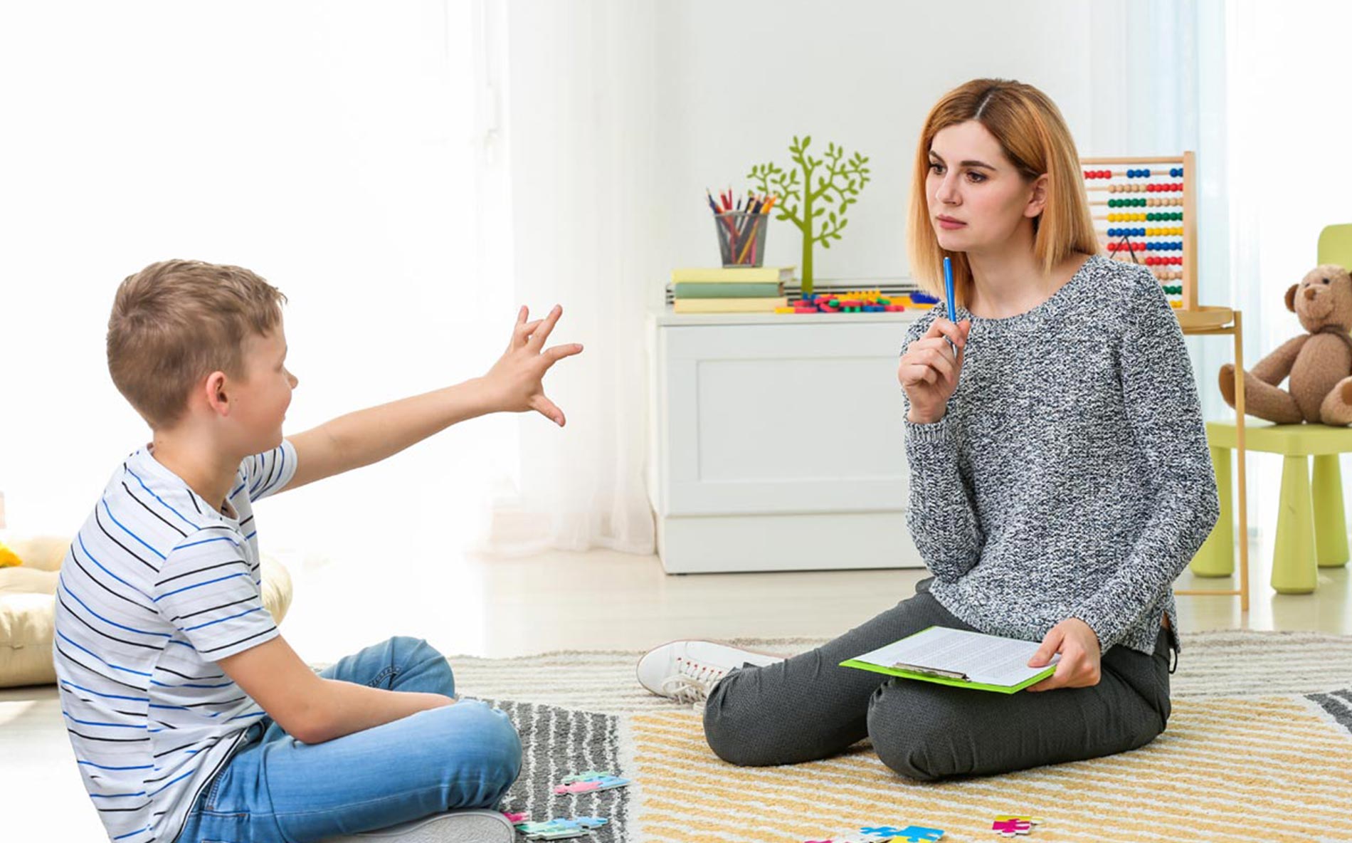 Child interacting with attentive adult.